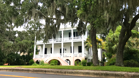 Discover Bay Street Beaufort. a large white house