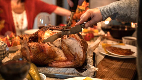 Thanksgiving on Fripp Island!. soemone carving a turkey