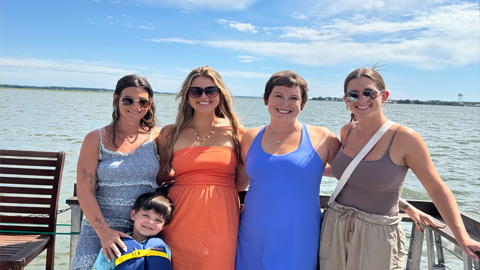 LowCo Tiki family fun. women and a little boy on a boat