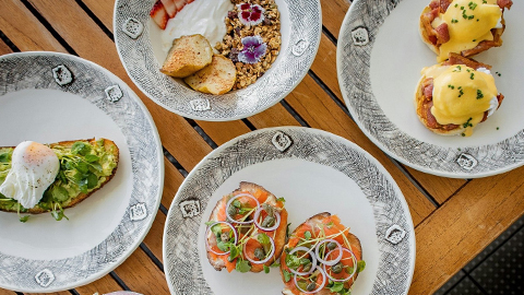 Magnolia Cafe. eggs benedict, a bagel with lox and other food